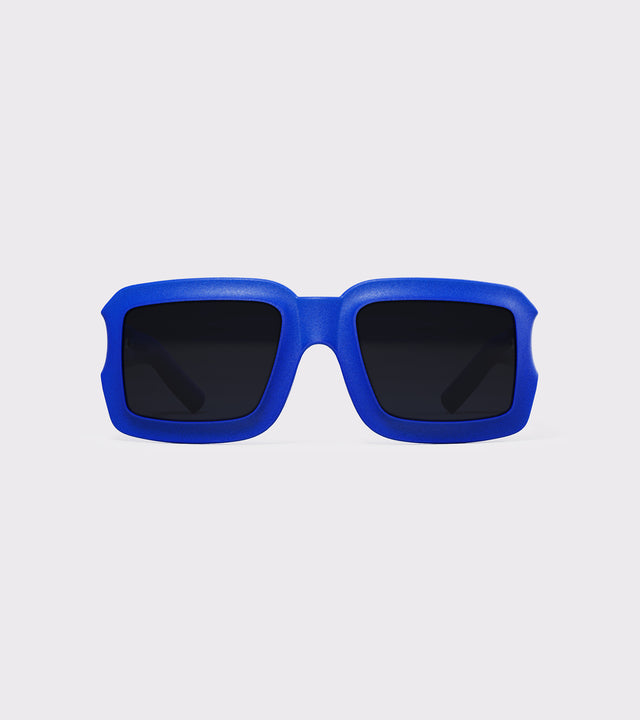 Bold Ultra Goliath blue square sunglasses with dark lenses, ideal for a modern, hip pop stylish look