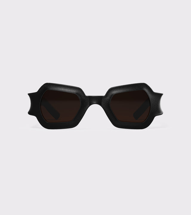 Bold black 3D printed sunglasses with unique geometric frames and dark lenses, designed for an excellent fit across different nose profiles